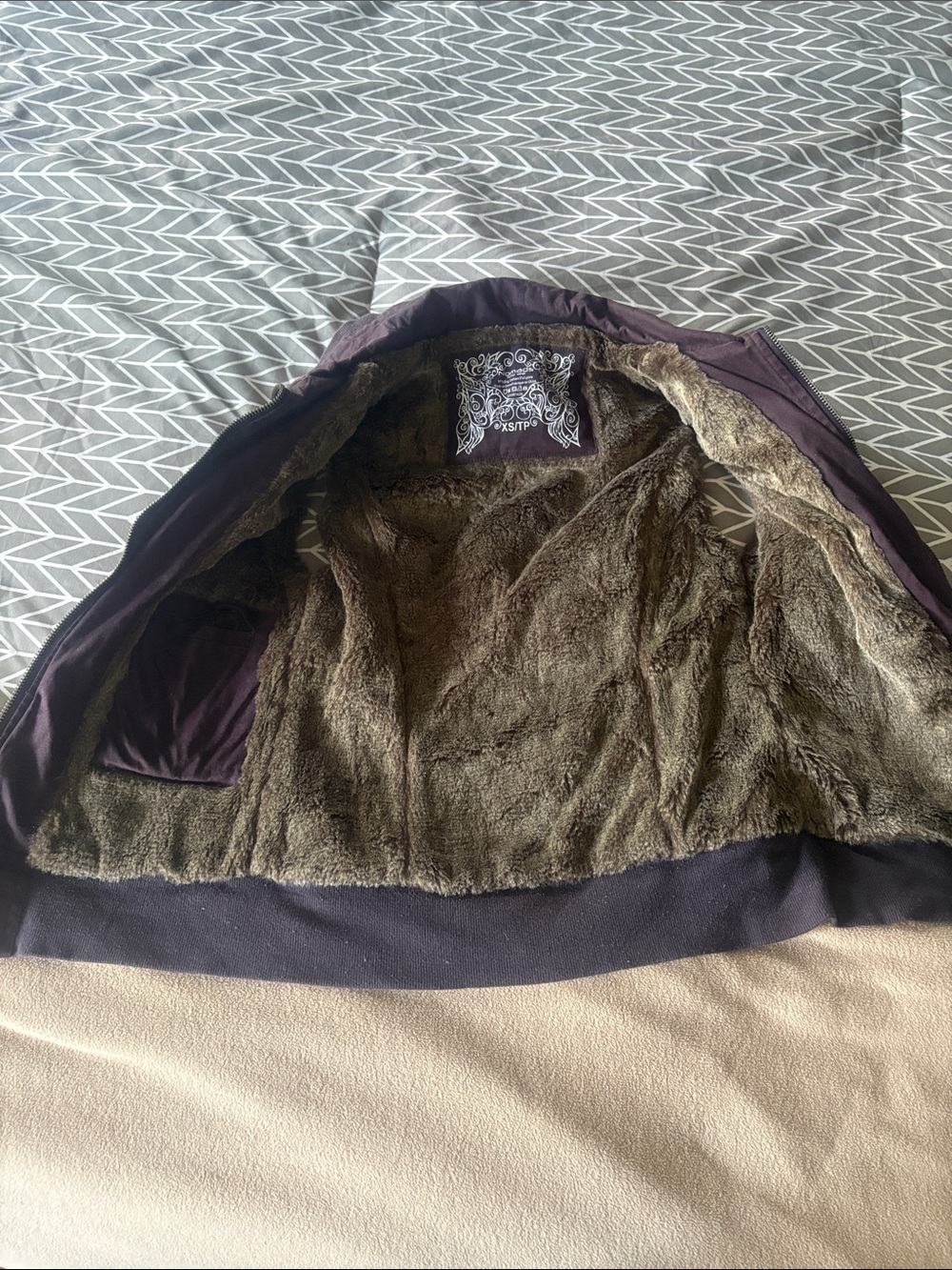 Nomad Women's Faux-Fur Lined Puffer Jacket in Deep Plum